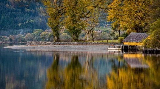 Discreet vertical sliding secondary glazing unit matching the meeting rails of an original sash and case window in Aberfoyle.