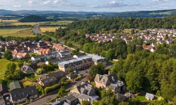 Discreet vertical sliding secondary glazing unit installed in a Stirling heritage property to match existing sash rails.