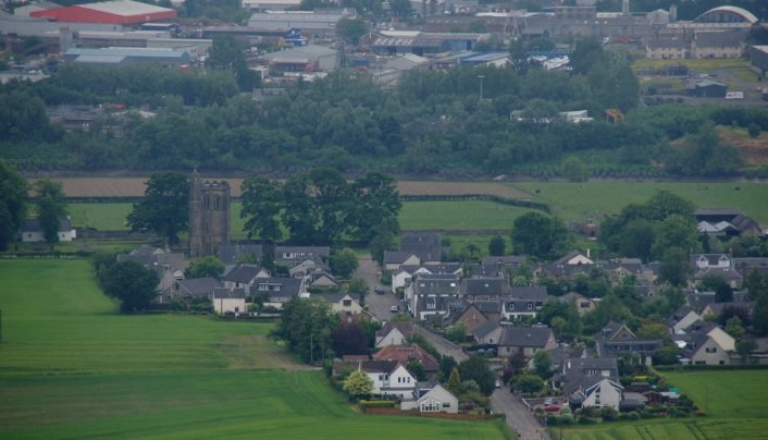 Slimline vertical sliding secondary glazing matching the meeting rails of an original timber sash window in Stirling.