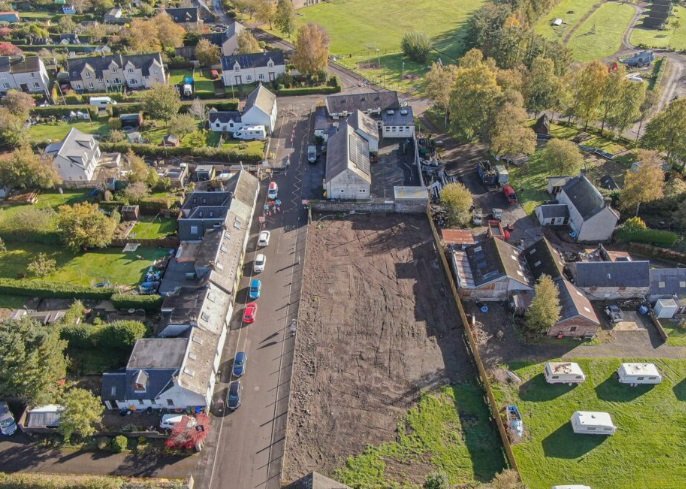 Discreet vertical sliding secondary glazing matching the original sash rails of a Stirlingshire conservation property.